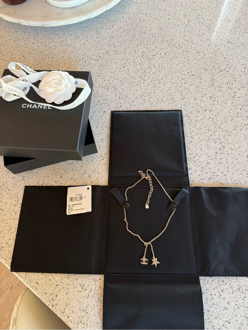 CHANEL Gold CC Logo & Star Charm Necklace